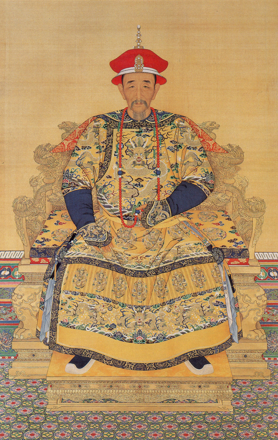 Portrait_of_the_Kangxi_Emperor_in_Court_Dress L'Empereur Xangxi